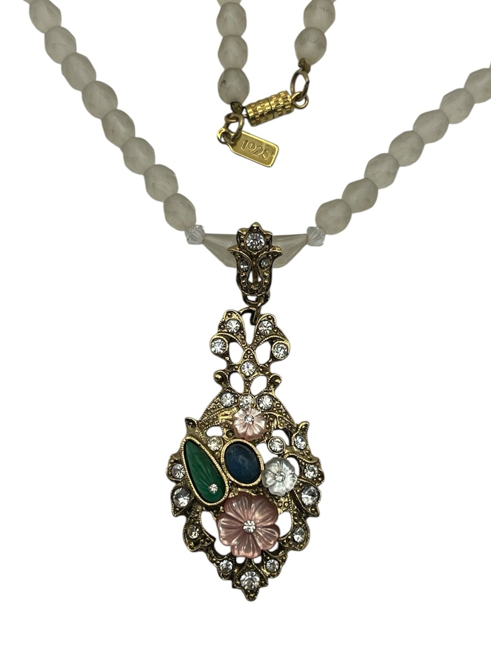 1928 molded Floral Stones rhinestone Pendant on beaded necklace vintage